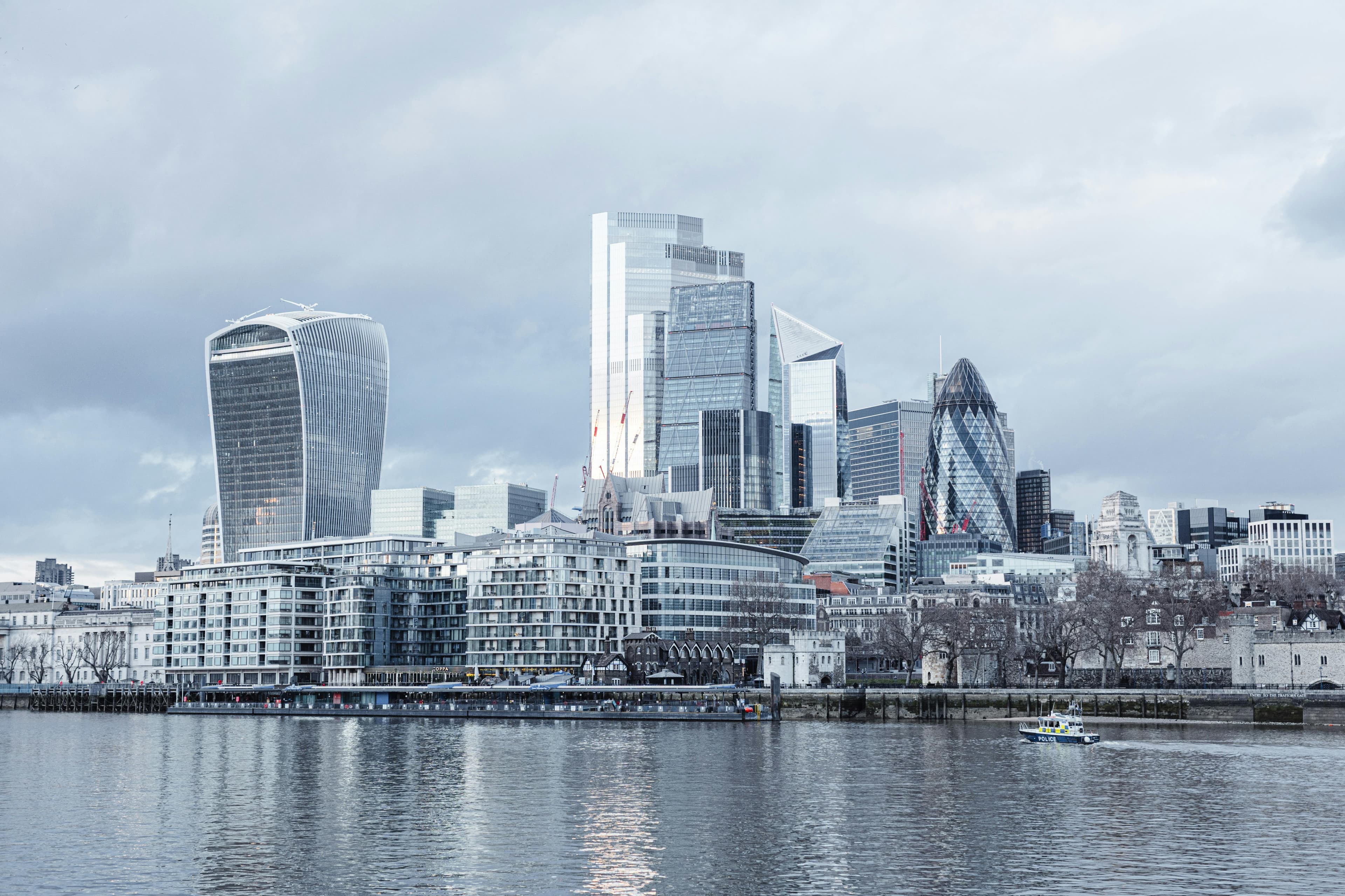 London skyline and streetscape, representing connectivity and scale.